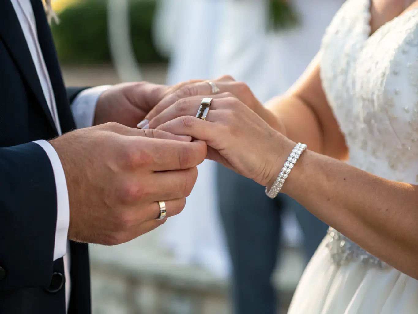 A close-up, vibrant image showcasing a couple holding hands intimately, symbolizing the restored connection and intimacy achieved through ResusRX's ED treatment.