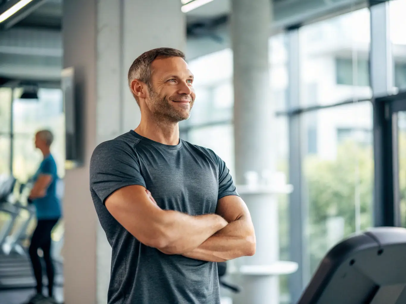 An image of a confident man smiling, representing the boost in self-esteem and confidence that comes with overcoming ED through ResusRX's treatment.